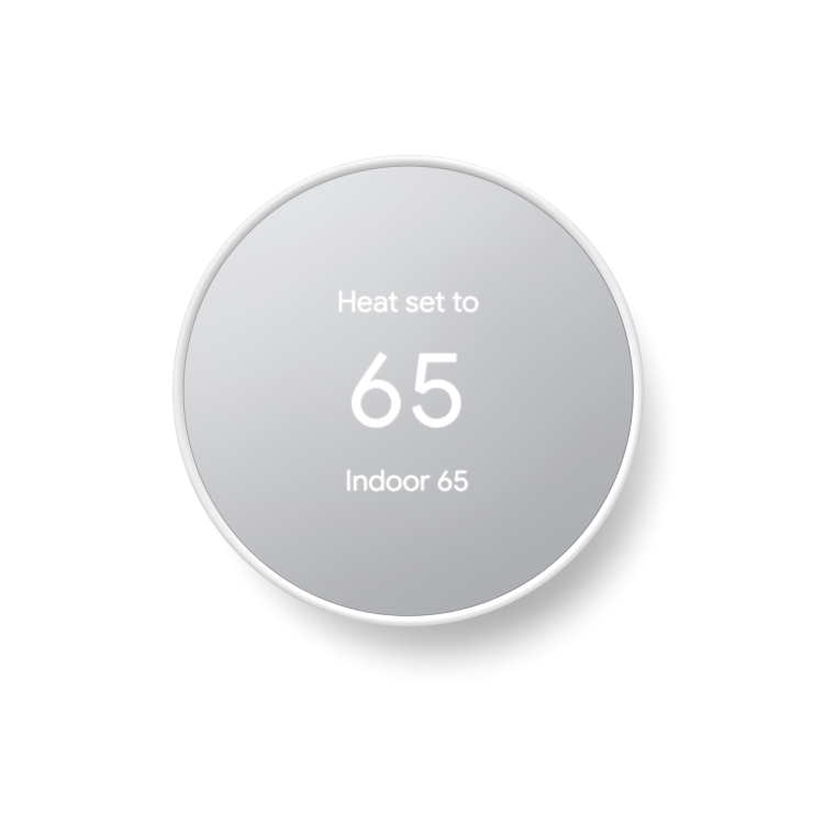 Nest thermostat in "fog" light gray color. The display reads "Heat set to 65".